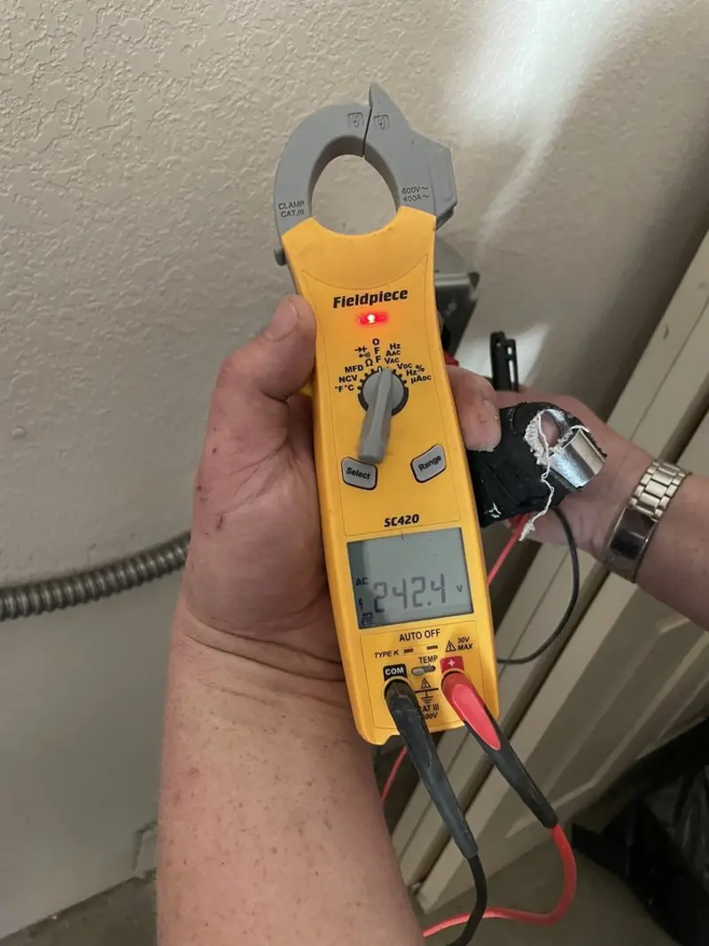 Voltage testing with clamp meter during Circuit Breaker Repair in Lebanon